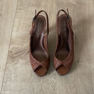 Bandolino leather peep toe sling back heels.